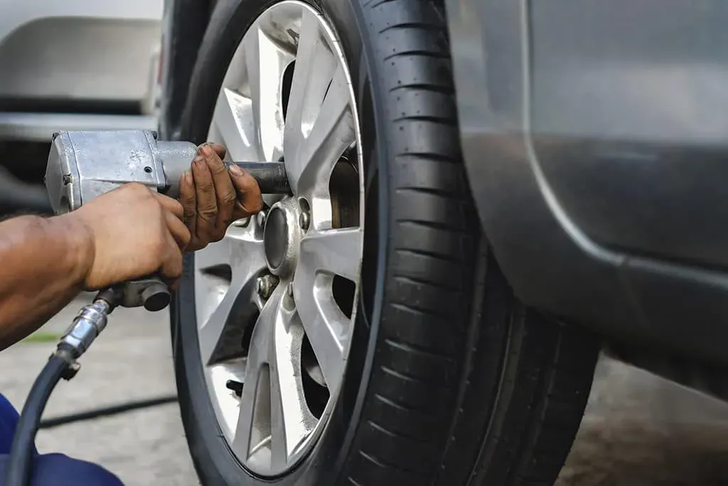 Wheel being secured to vehicle